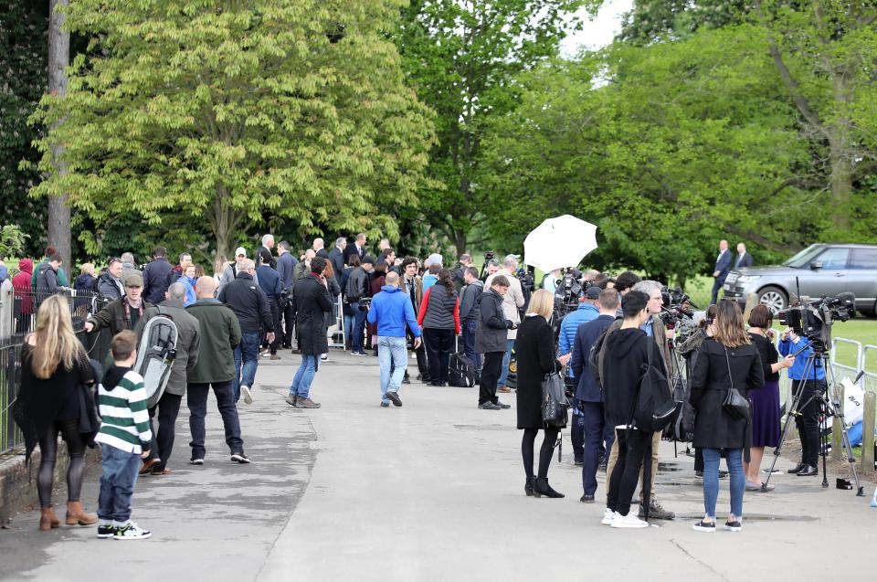  Media and the public lined the streets close to the church hoping to see the bride