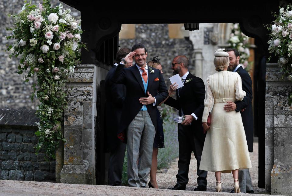  Best man Spencer Matthews gave a cheeky salute outside the church