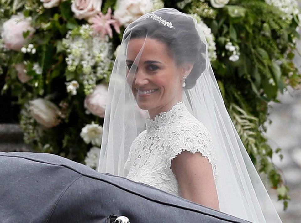 Beautiful bride Pippa Middleton walks into the church to marry her man James Matthews