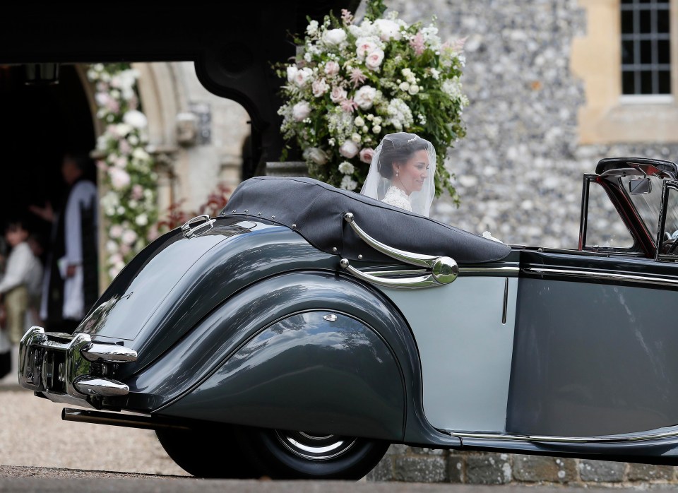 Pippa arrived in an open-topped old-fashioned motor