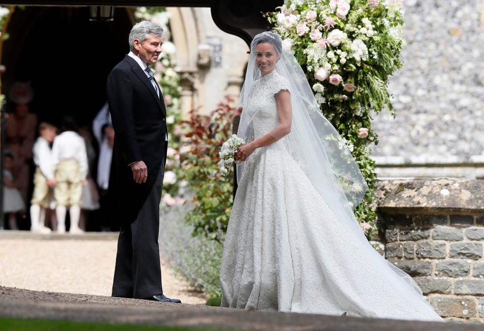  Beautiful bride Pippa Middleton walks into the church to marry her man James Matthews