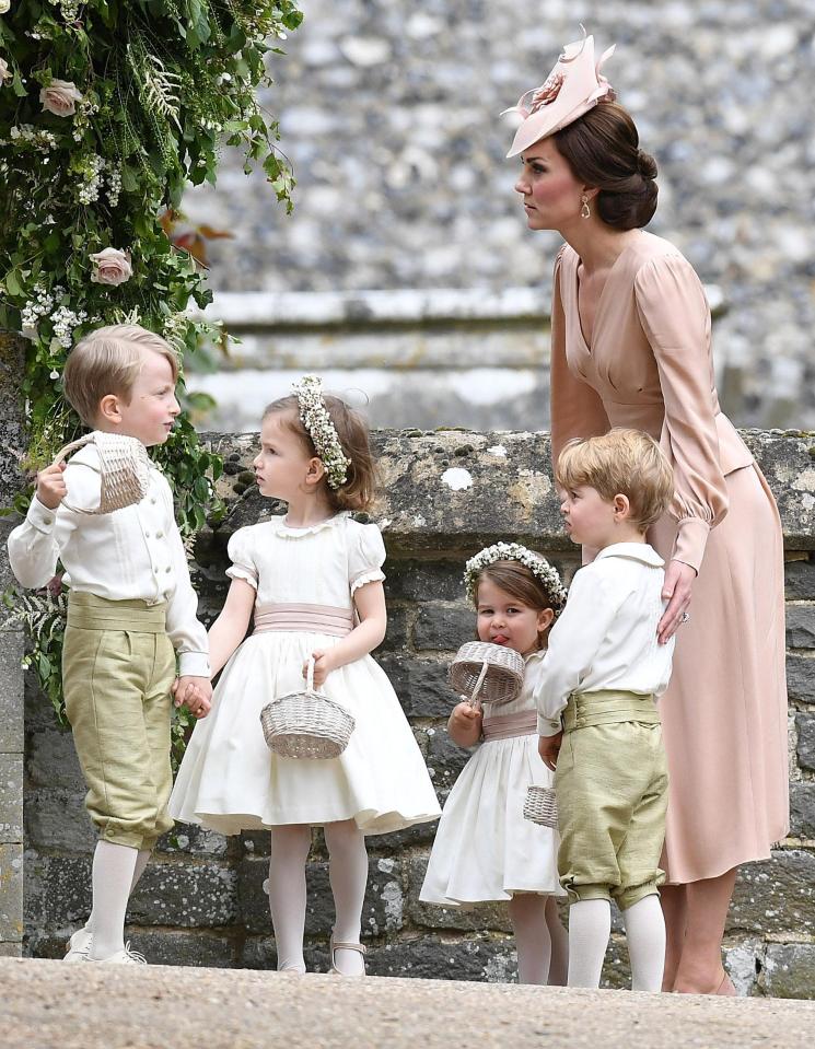  It looked as though Kate had taken charge of the four page boys and four flower girls