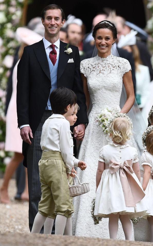  The happy couple were pictured hand in hand as they were surrounded by adorable youngsters