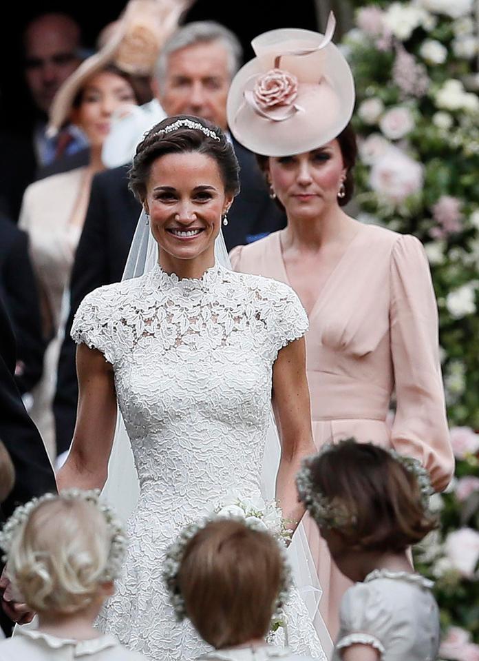  Pippa couldn't stop smiling after saying her vows to husband James