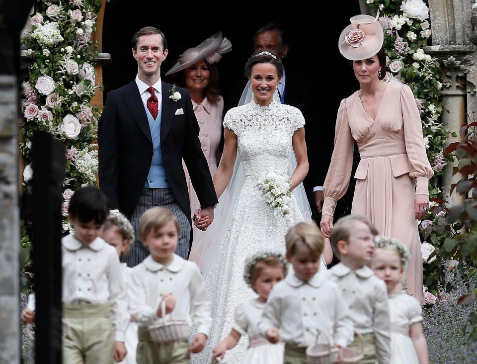  Kate Middleton joins newlyweds James and Pippa as they stroll out of church a married couple