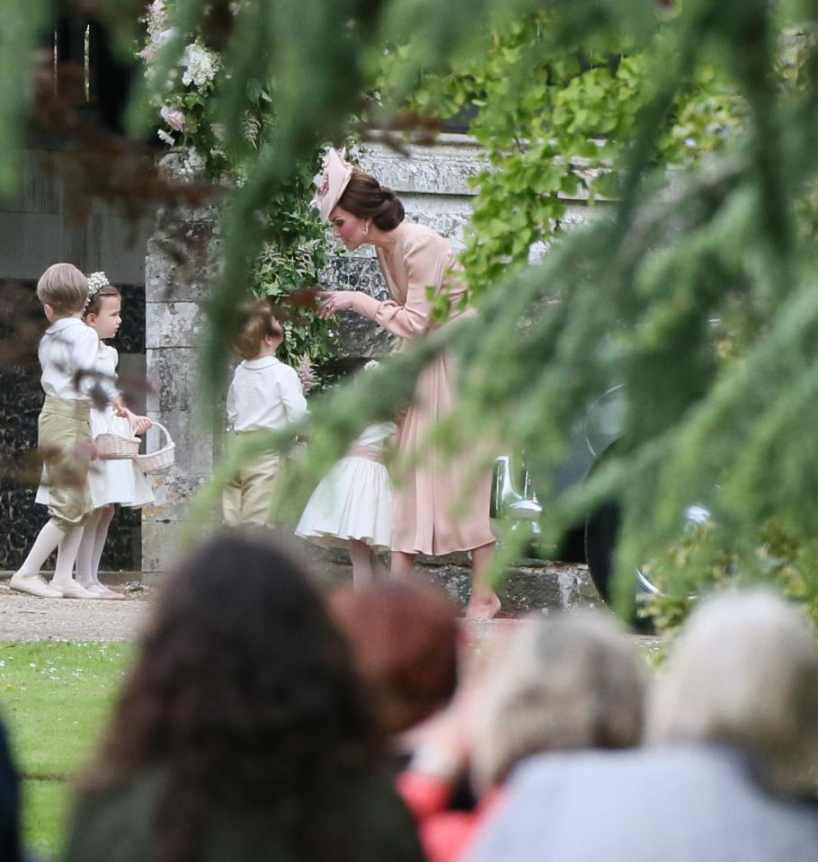  Prince George was given a right royal telling off by his mum Kate after the ceremony today