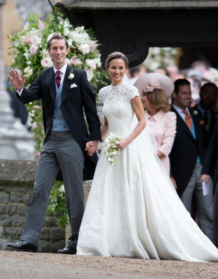 Smiling Pippa posed for photographers in her show-stopping, guipure lace gown gown