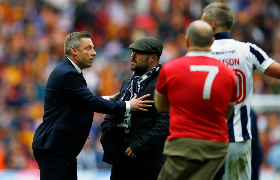  Neil Harris tells fans to leave the pitch