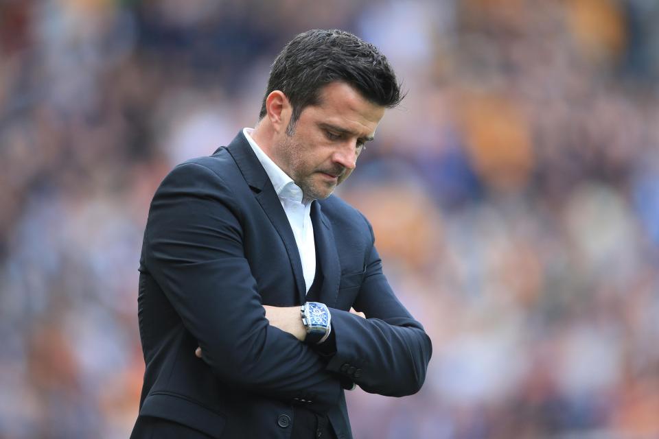  Marco Silva looks dejected as his team are thrashed by Spurs