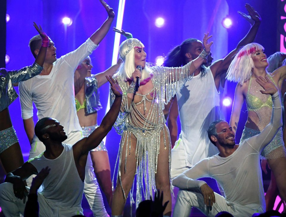  The silver outfit was worn for a performance of her dance floor classic Believe