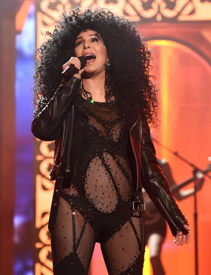  The singer then revealed a second outfit change, a throwback to her iconic black diamante catsuit of 1989