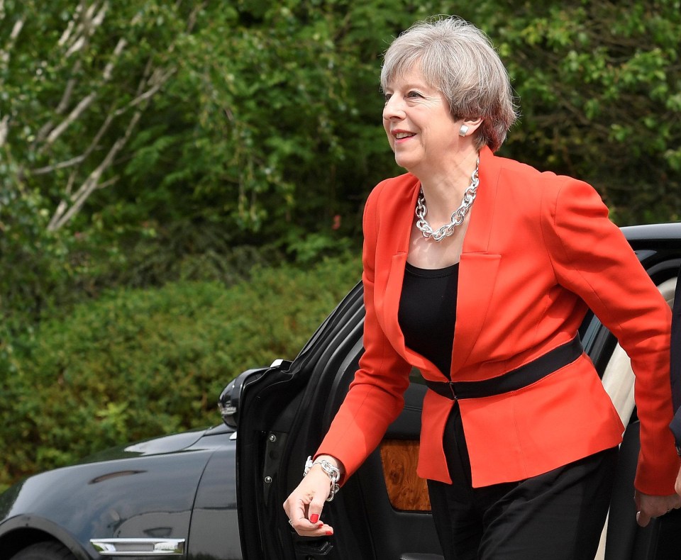 Theresa May wore a chunky chain and matching bracelet while campaigning yesterday