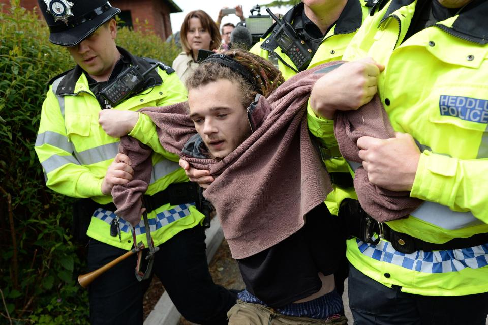  As she arrived a protester was arrested by police