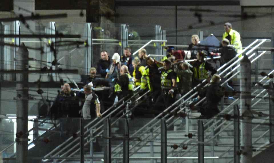  Casualties are carried out of the arena in Manchester this evening as the hospital declared a state of emergency