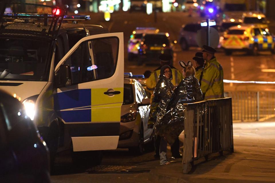  Emergency services tend to victims of the deadly attack on Monday night