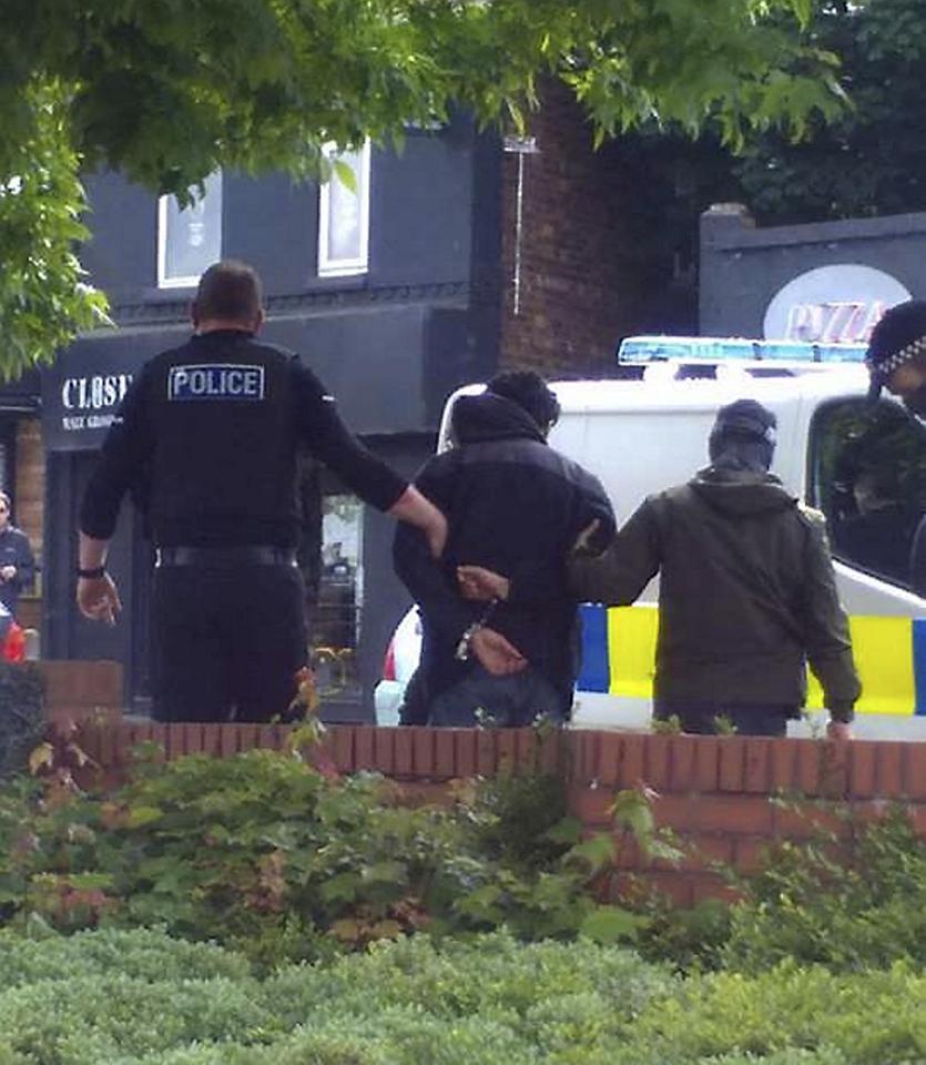  Dramatic moment armed cops arrested a 23-year-old man outside Morrisons in Chorlton, south Manchester yesterday morning