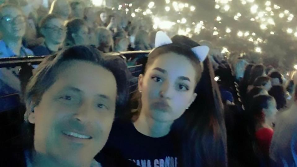  The 49-year-old (pictured with his 14-year-old daughter) said he initially thought the blast was a stage balloon bursting