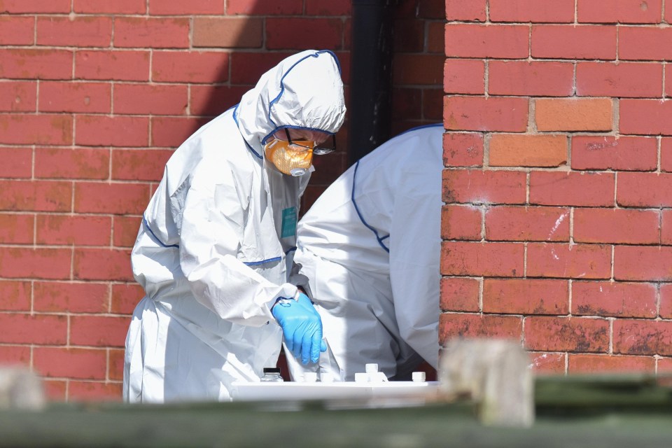 Forensic teams at the a house in Fallowfield, Manchester