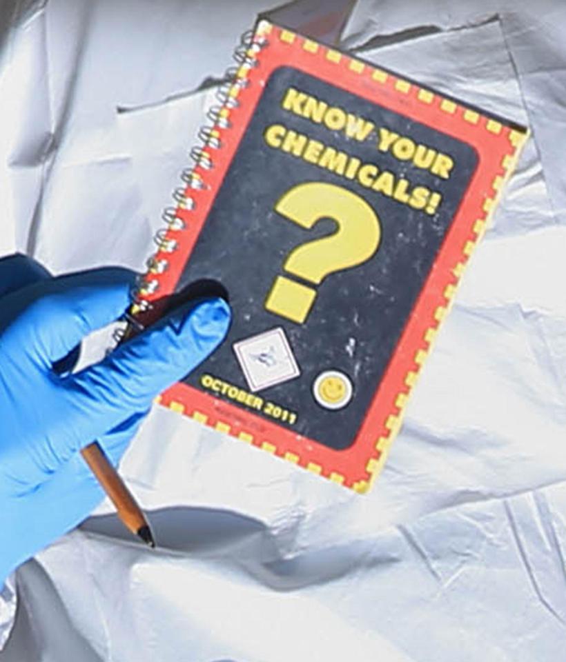  An officer was seen holding a 'Know Your Chemicals' booklet as he left the property today