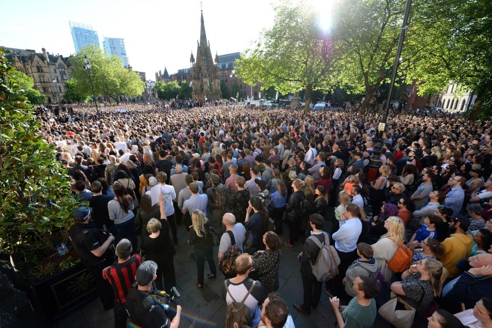  Hundreds gathered for a vigil in Albert Square outside Manchester Town Hall yesterday following the devastating attack