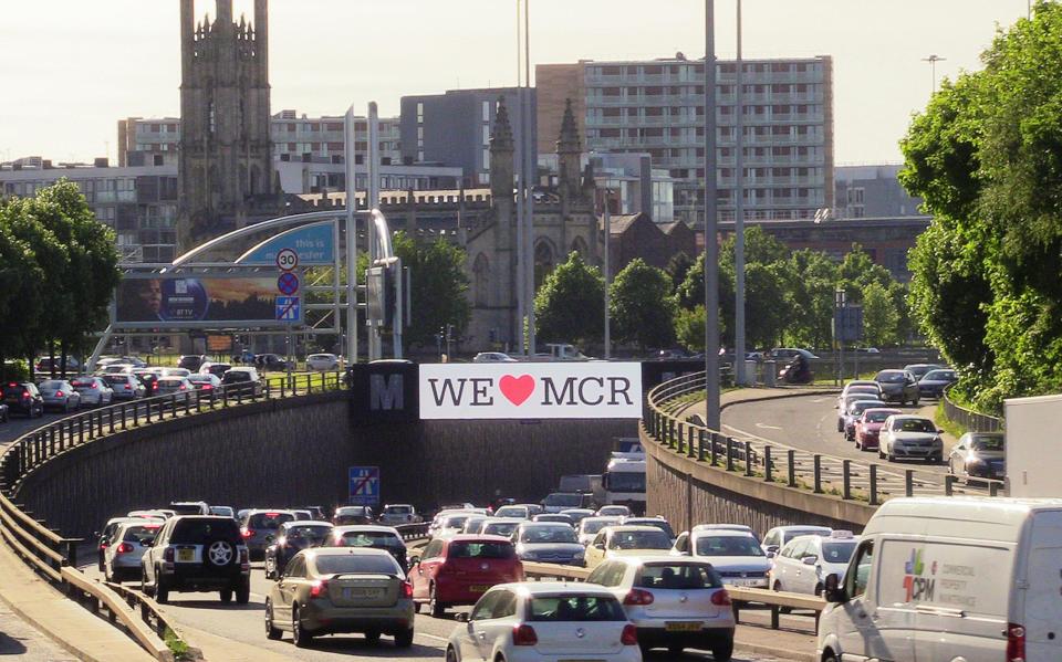  A sign saying ' we love Manchester' was displayed on the Mancunian way in the city centre yesterday