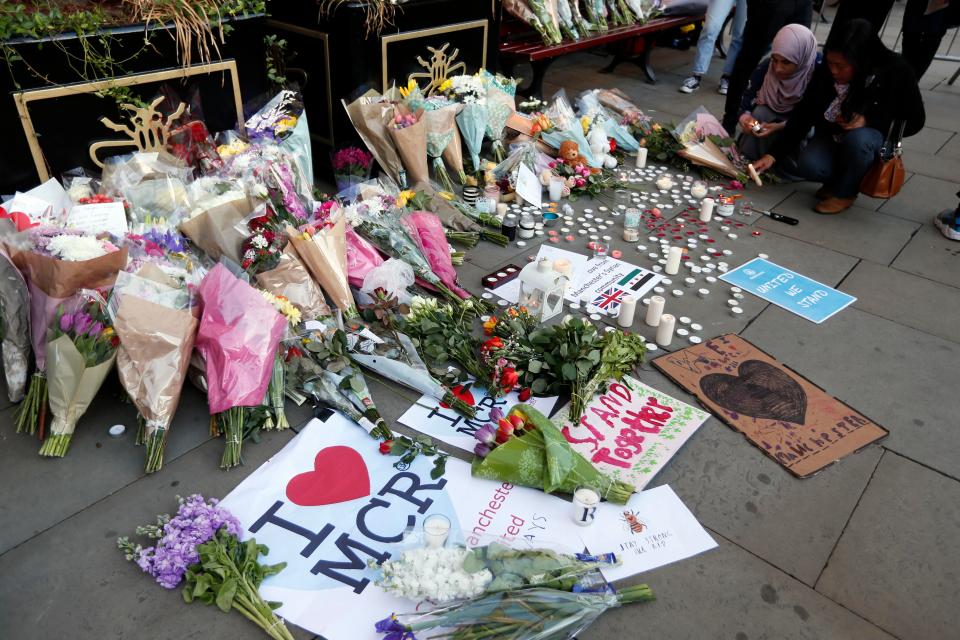  Tributes were left outside the venue after the shocking attack