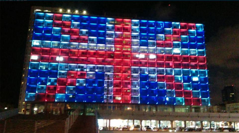  A municipal building in Tel Aviv, Israel, joins the respectful tributes across the world