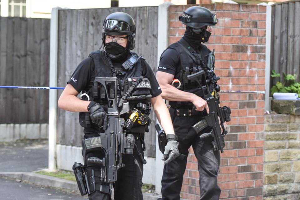  Armed police during another raid in Whalley Range last week