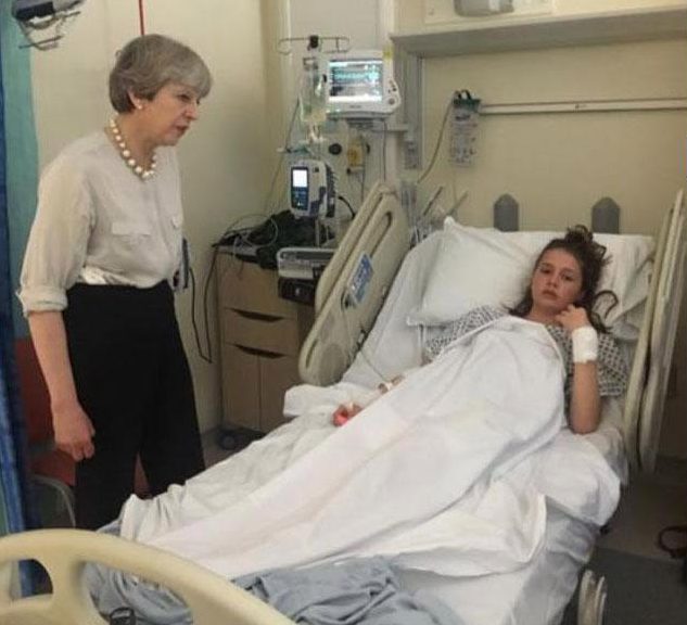  Evie, 14, was pictured with Theresa May as she recovered in hospital