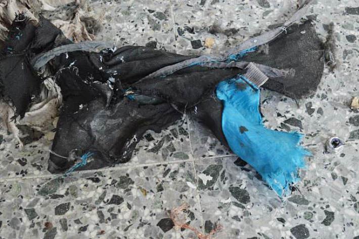  Pictures from the scene show the remnants of a backpack used by the bomber