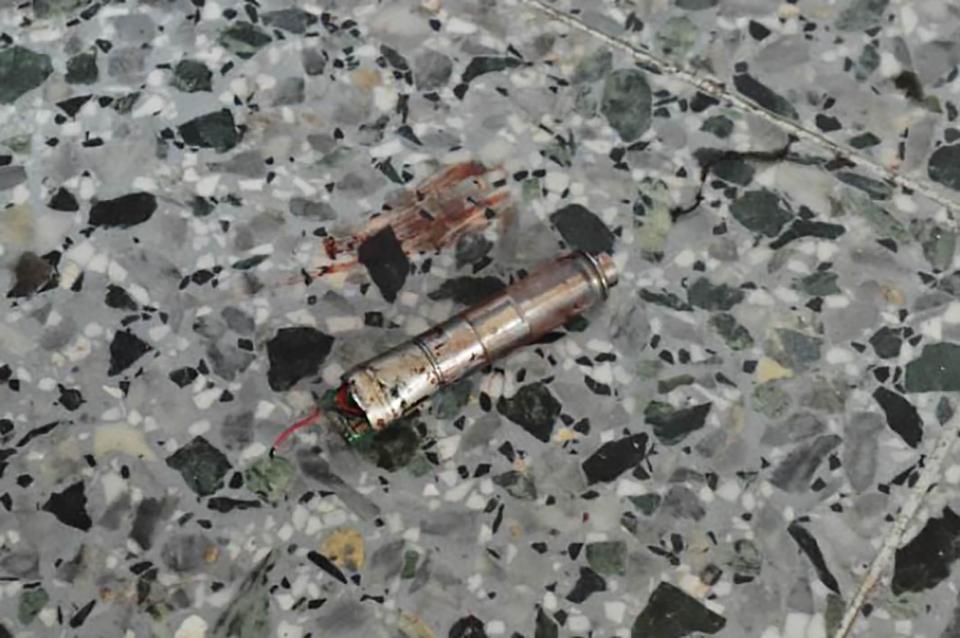  Possible detonator was found in the bomber's left hand. It is unusually sophisticated in using a small circuit board and could have been a simple switch device or radio controlled