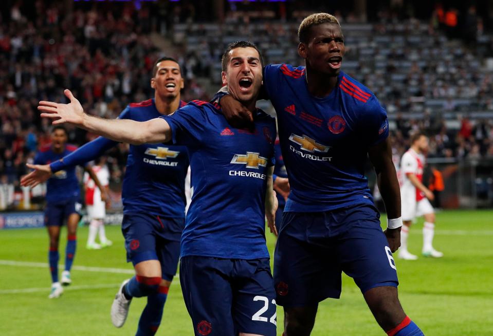  United's goalscorers Henrikh Mkhitaryan and Paul Pogba celebrate their second goal