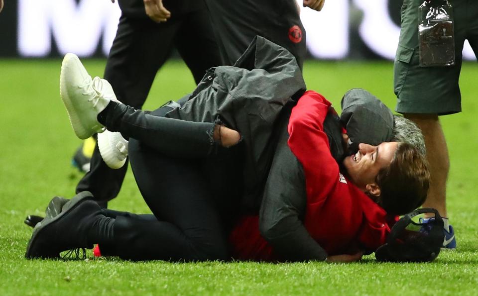  Jose Mourinho was joined on the pitch by his son following the full time whistle in an emotional celebration