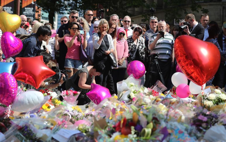  Hundreds of people joined in the minute's silence in St Anne's Square this morning