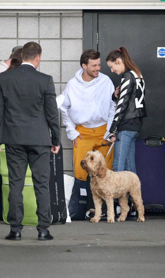  Louis Tomlinson grinned at Eleanor Calder as he filmed his latest music video