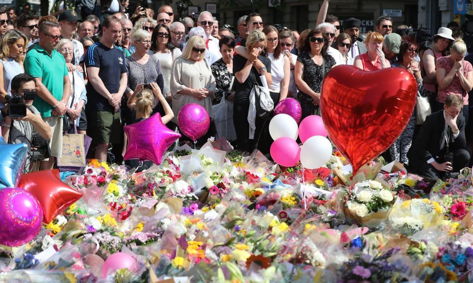  Visitors to St Ann's Square joined the nation in falling silent for a minute at 11 o'clock