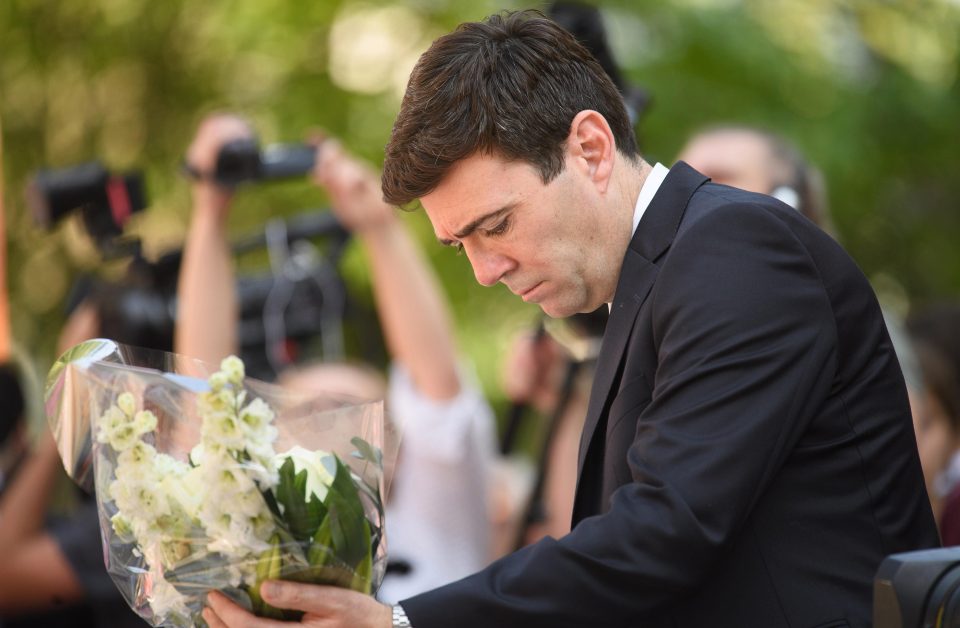  Greater Manchester mayor Andy Burnham laid flowers at vigil held in the city's St. Anne's Square this morning