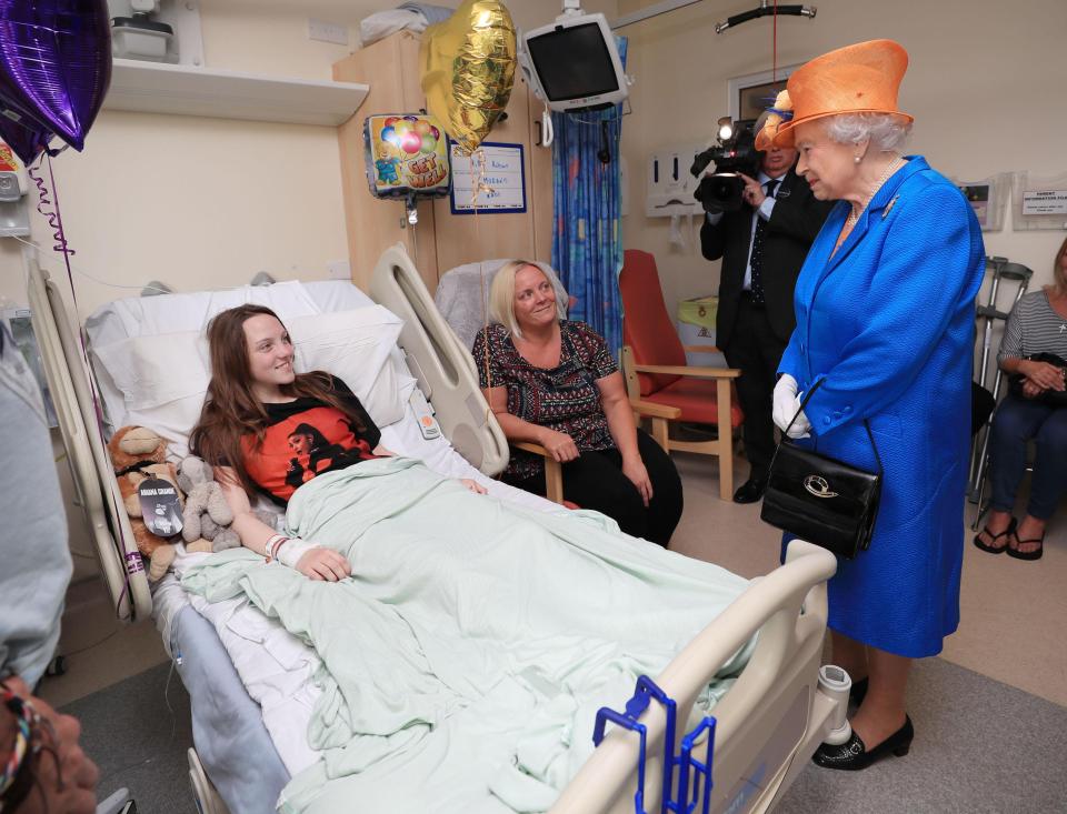  The Queen speaks to Millie Robson, 15, from Co Durham, and her mum Marie