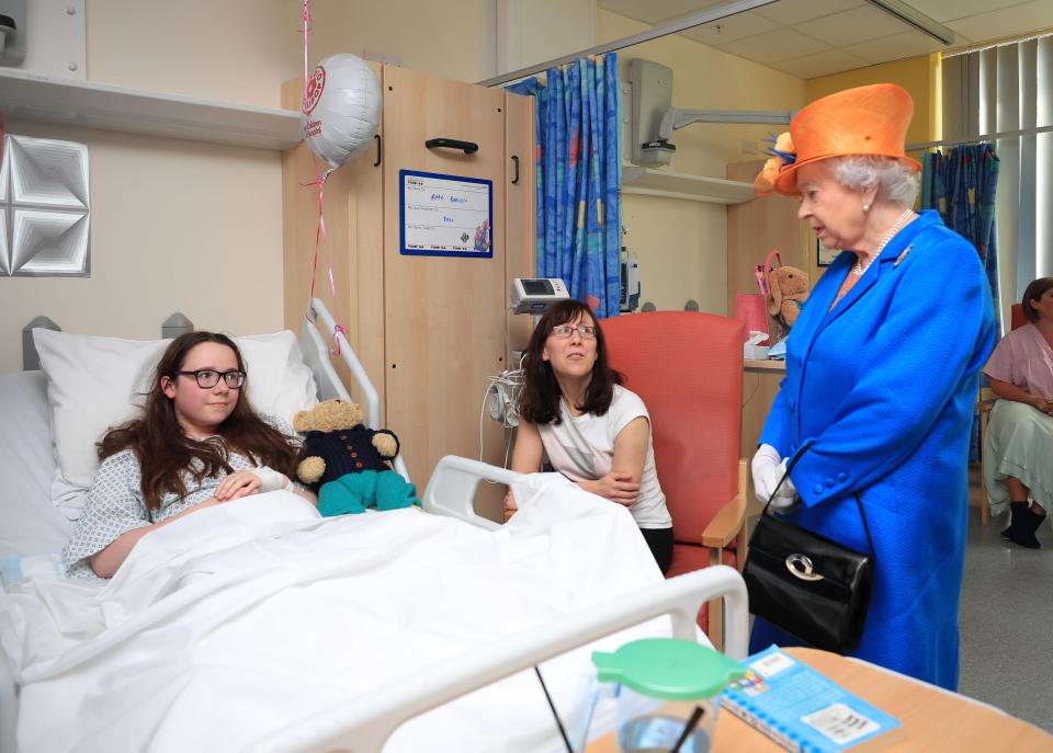  The Queen speaks to Amy Barlow, 12, from Rawtenstall, Lancs, and her mum Kathy