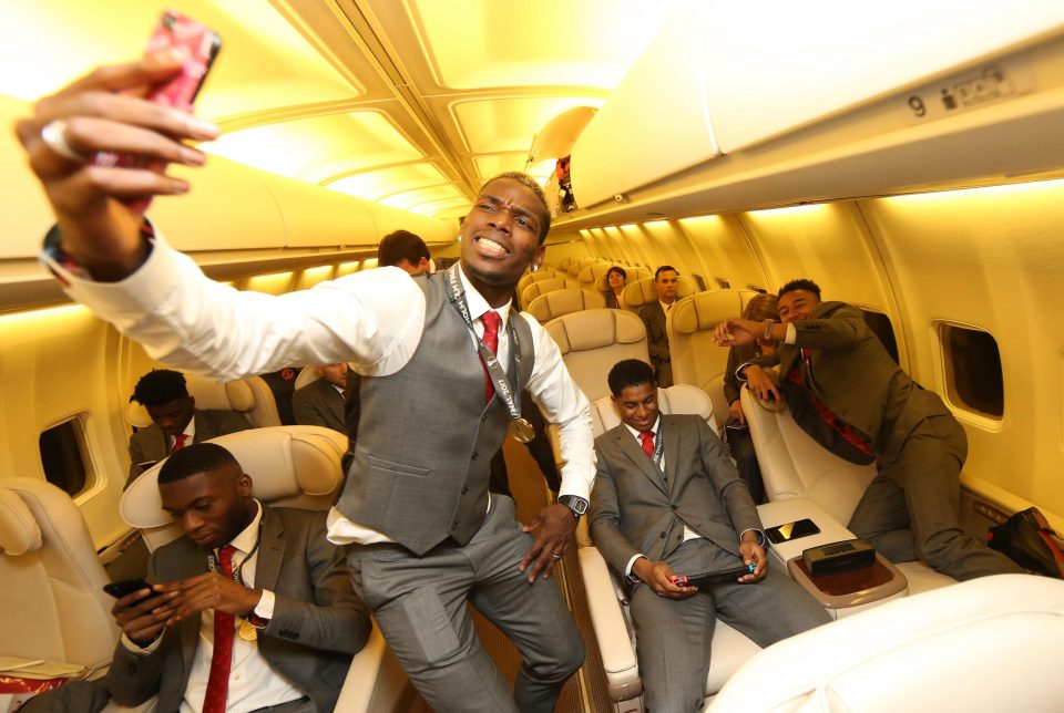  United goalscorer Paul Pogba takes a selfie on the flight from Stockholm