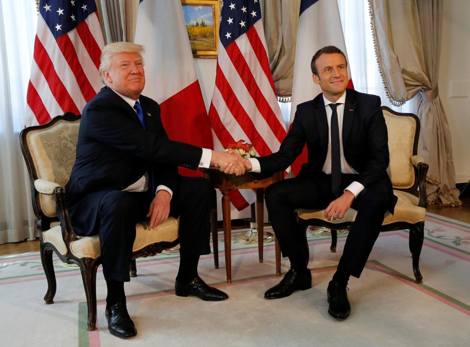  US President Donald Trump and French President Emmanuel Macron shake hands