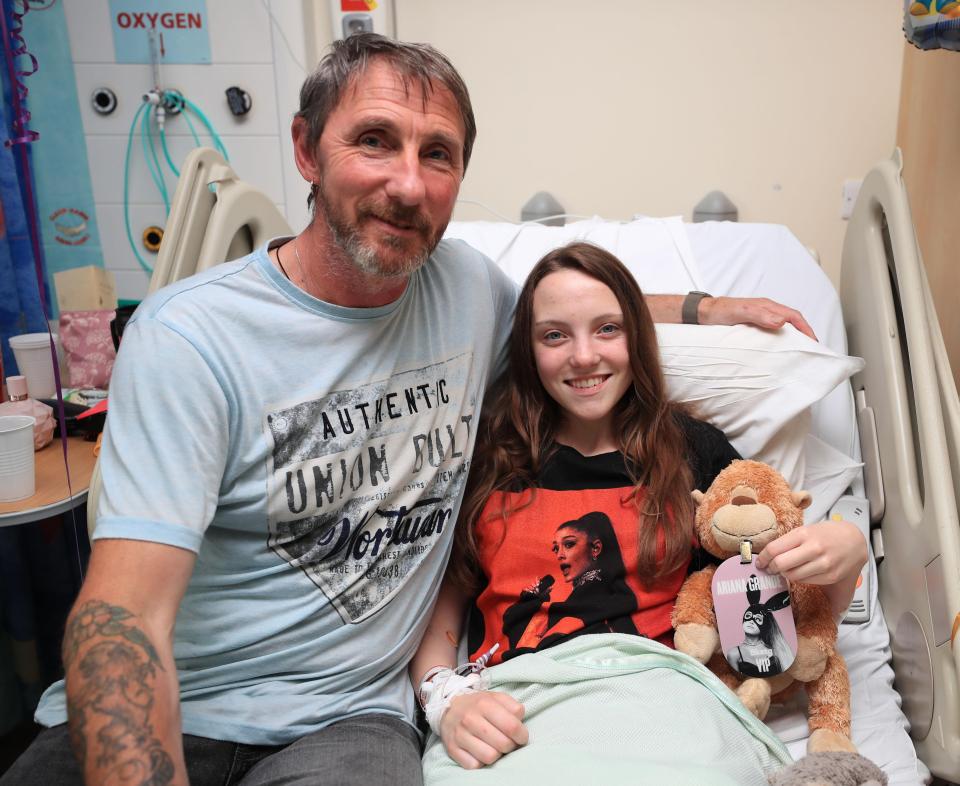  Millie, pictured with her dad, wore an Ariana Grande T-shirt