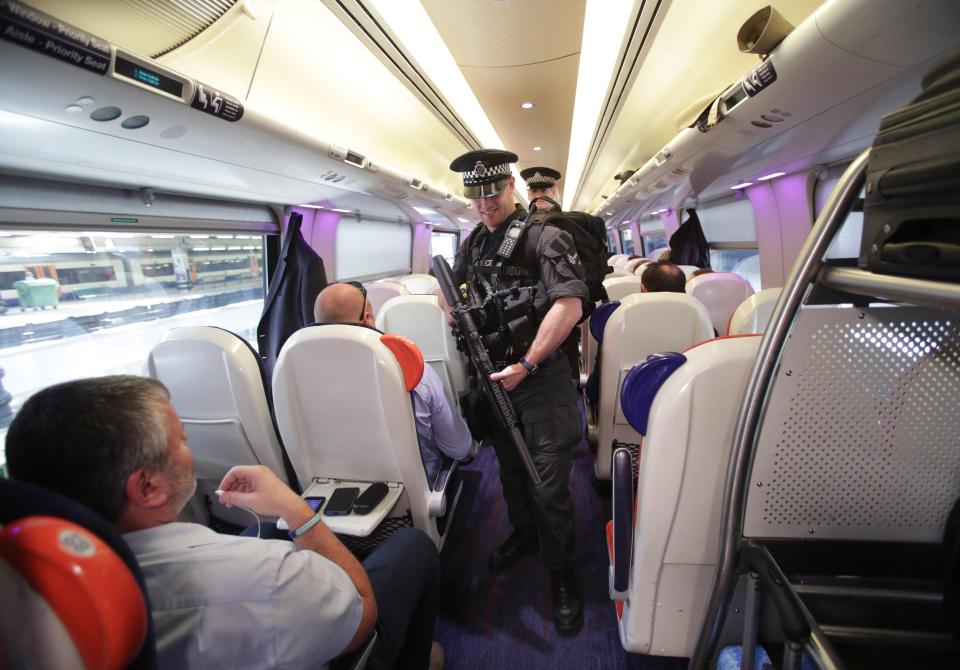  Armed police will patrol trains in the UK for the first time as security levels are stepped up