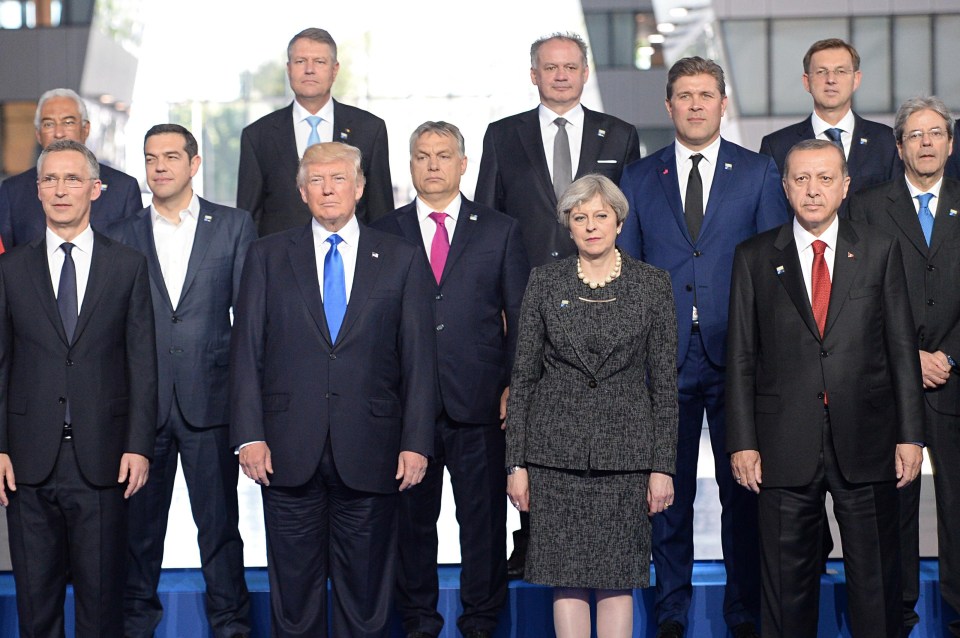 The leaders of Nato countries pose for the camera, including German Chancellor Angela Merkel, NATO Secretary General Jens Stoltenberg, US President Donald Trump, Prime Minister Theresa May and President of Turkey Recep Tayyip Erdoga