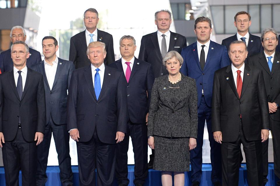  The leaders of Nato countries pose for the camera, including German Chancellor Angela Merkel, NATO Secretary General Jens Stoltenberg, US President Donald Trump, Prime Minister Theresa May and President of Turkey Recep Tayyip Erdogan