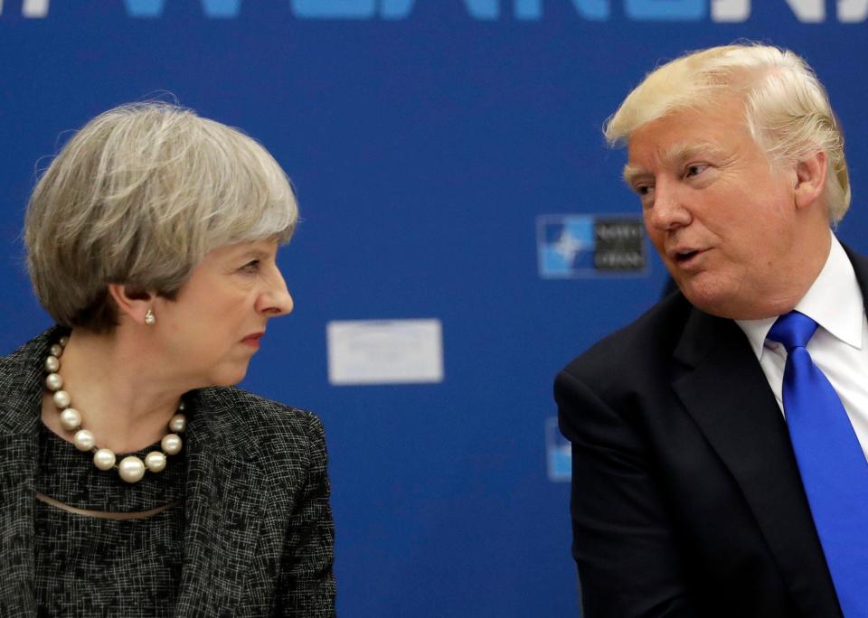  Theresa May, pictured with Donald Trump, is in Italy for the G7 summit