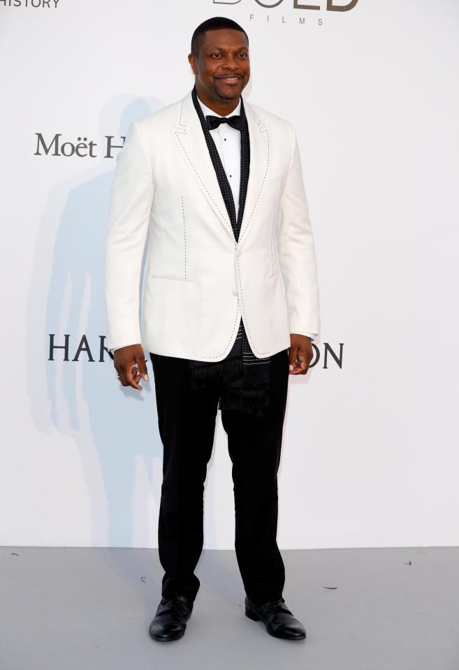  Funnyman Chris Tucker teamed a white jacket with black trousers