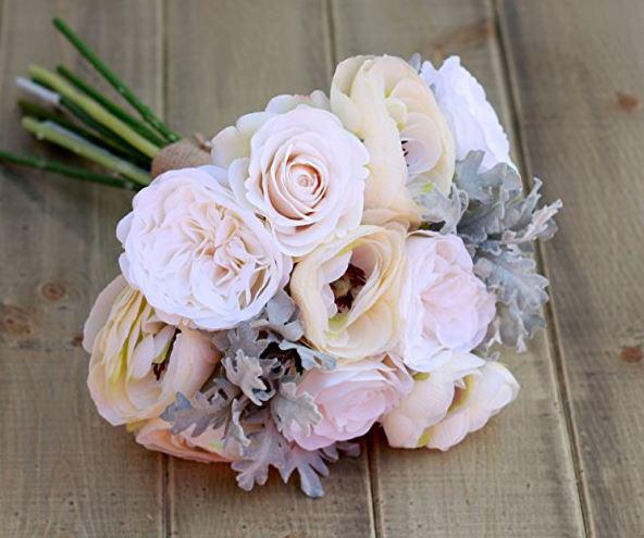  While this ivory and creme bridal bouquet costs £45.50 on Amazon's new wedding Handmade store