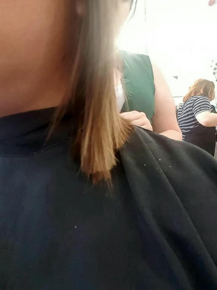  Sarah was shocked when the hairdresser began cutting her hair into a bob