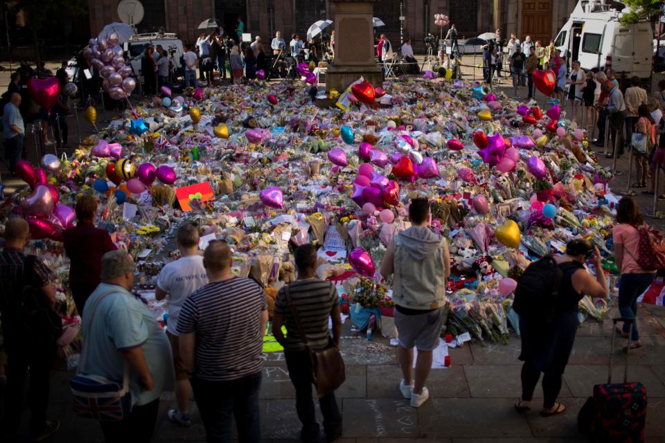  People have left hundreds of tributes to the victims in St Ann's Square, central Manchester